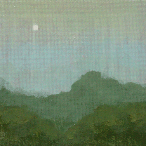 Hazy mountain landscape with a moonlit sky